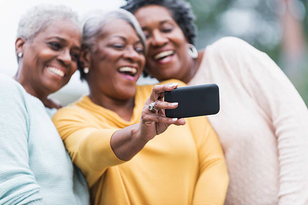istock Senior black women taking a selfie 466656990