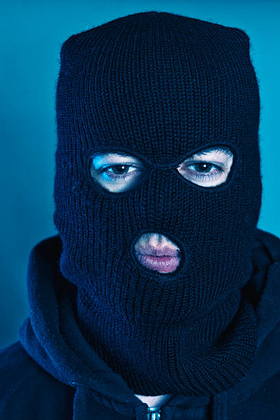 istock Portrait of terrorist or robber with a black mask 466657204
