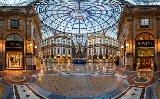 Milan, Italy - January 2, 2015: Galleria Vittorio Emanuele II in Milan. It's one of the world's oldest shopping malls, designed and built by Giuseppe Mengoni between 1865 and 1877.