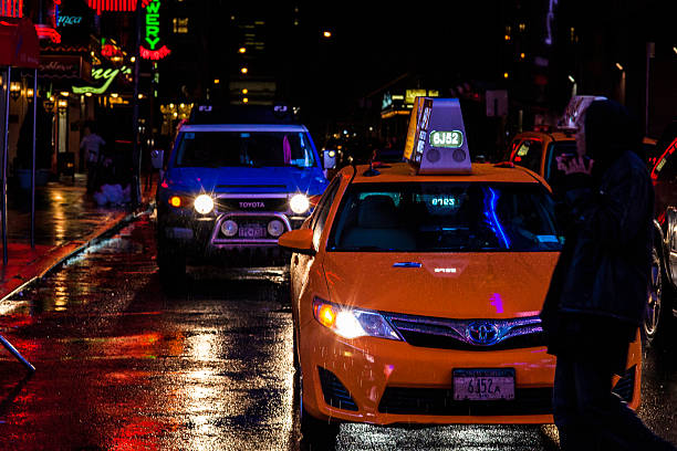 Rainy street at night in New York City.