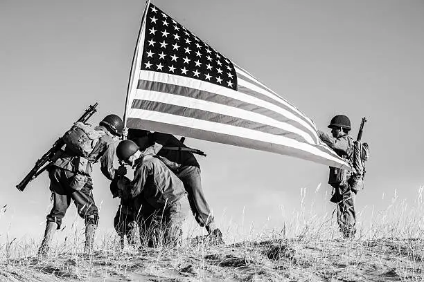 Soldiers Raising the US Flag (Stock Image)