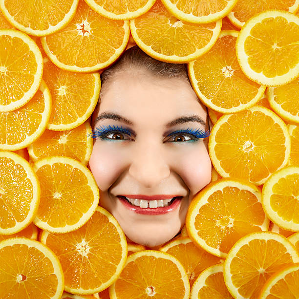 istock Woman and oranges 466667834
