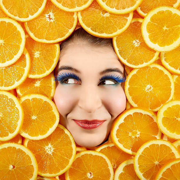 istock Woman and oranges 466667838