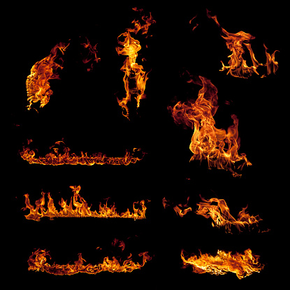 Set of burning fire flame elements isolated on black background. Stock photo.