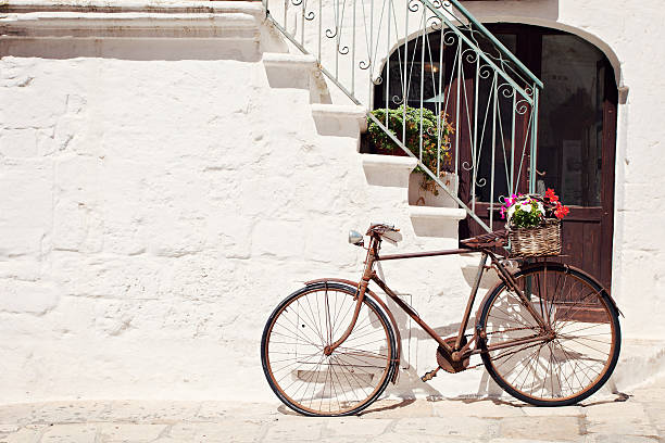 istock An Italian old style bicycle by the steps 466672556