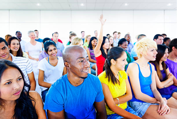 istock Ethnically diverse group of young people in a training class 466673738