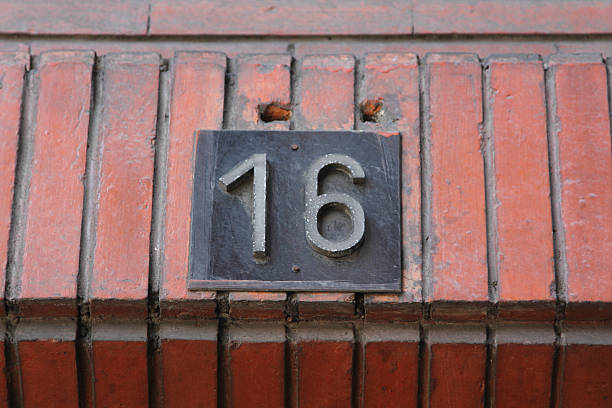 istock number sixteen (16) on a wall 466674417