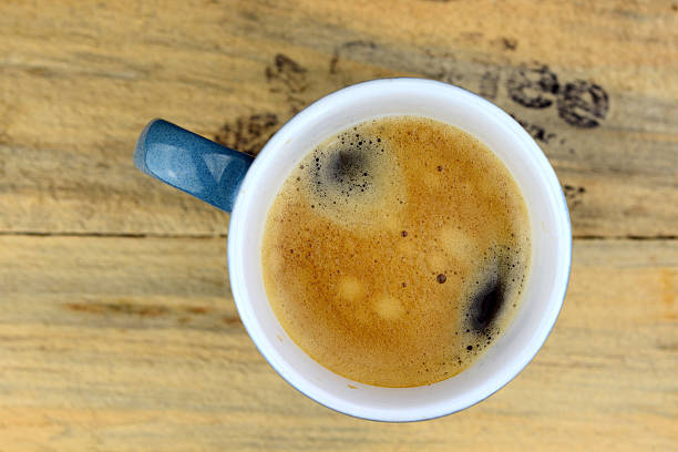 istock Coffee mug on old wood with text 466675750