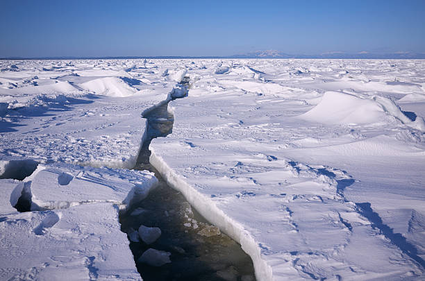 Ice sea crack Arctic cold sea, solid ice landscape with crack antartica stock pictures, royalty-free photos & images