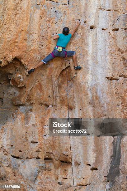 Woman Rockclimbing In Kalymnos Stock Photo - Download Image Now - 2015, Activity, Adult