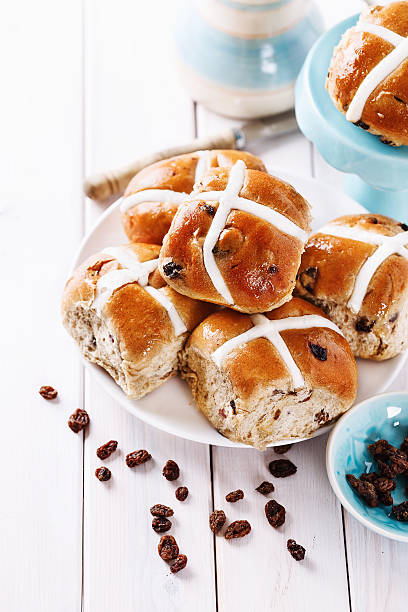 istock Easter cross-buns on a white wooden background 466677506
