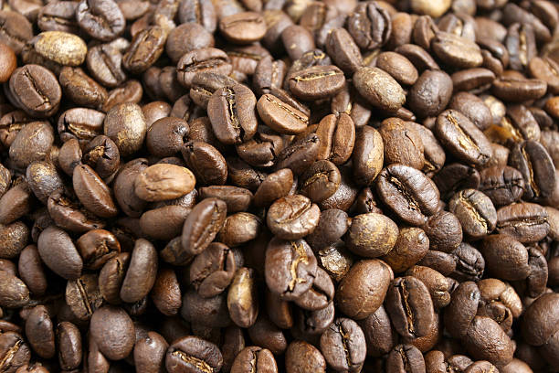 istock coffee beans and coffee to drink 466681086