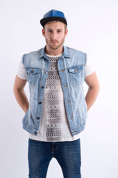 istock Male fashion model standing with hands on hips 466681742