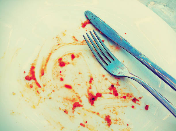 istock Dirty plate with knife and fork signifying an eaten meal. 466683701
