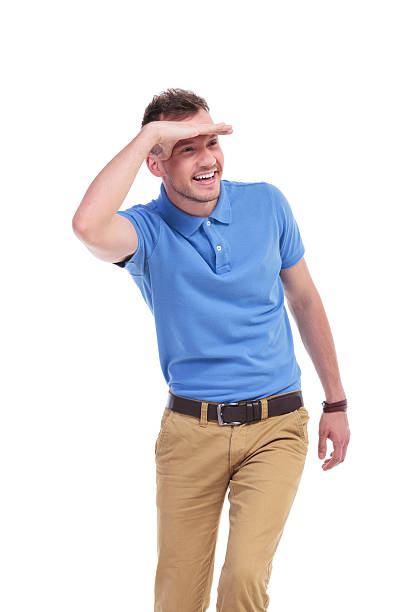 istock casual young man looks away and smiles 466683880