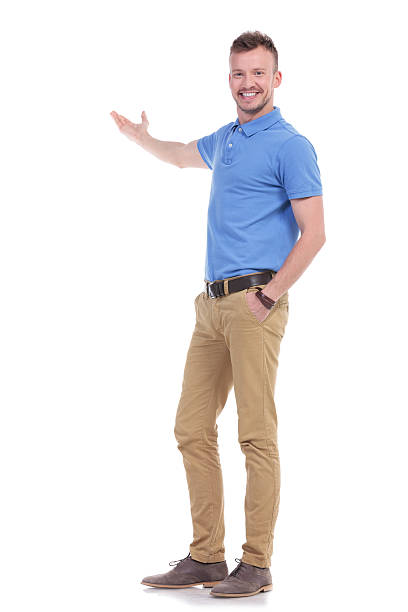 istock happy casual young man presents something 466684500