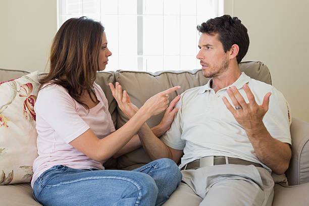 istock Couple having an argument in living room 466687132