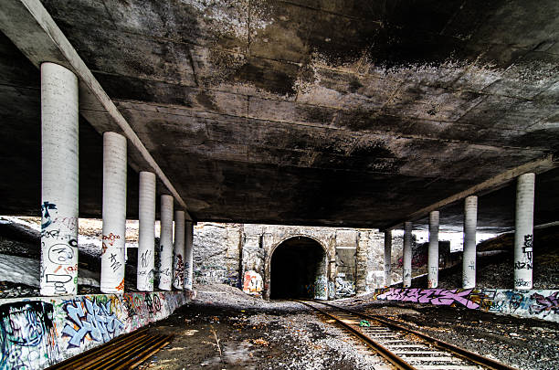 istock Abandoned Railroad tunnel and overpass day summer 466688237