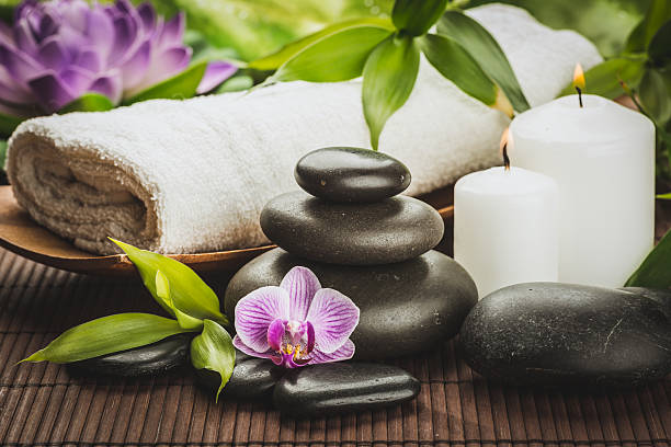 istock Spa still life capturing candles, zen stone stack and towel 466688932