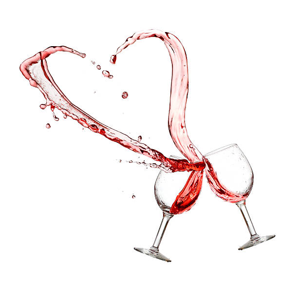 istock Two glasses of red wine with heart splash 466693313