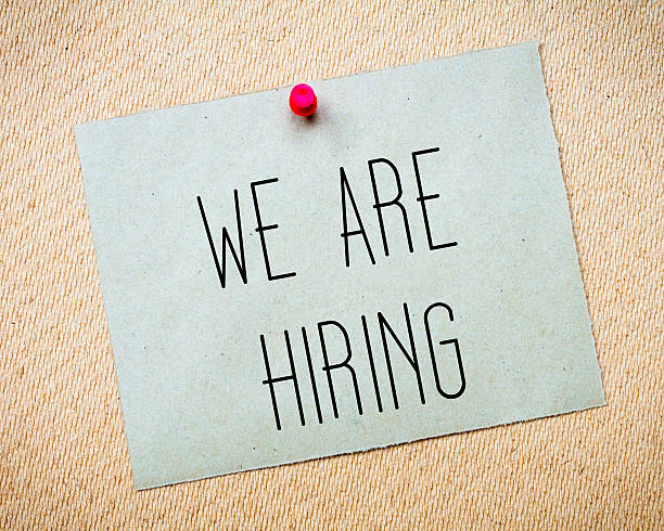 istock Recycled paper note pinned on cork board.We are hiring Message 466694860