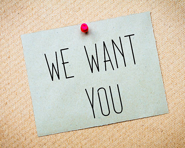 istock Recycled paper note pinned on cork board.We want you Message 466694862
