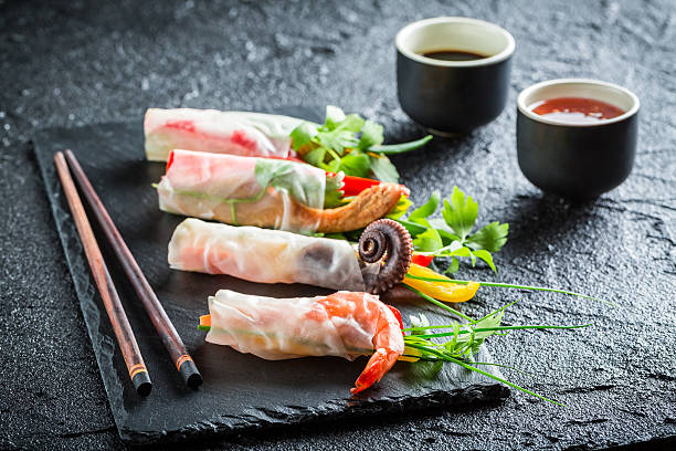 istock Enjoy your spring rolls with seafood and vegetables 466694898