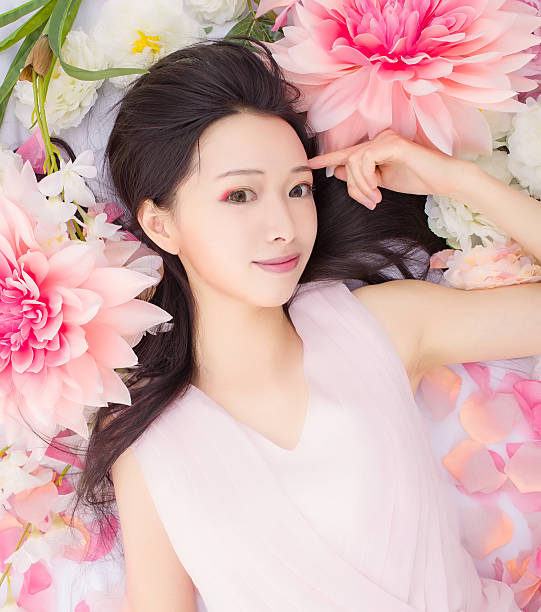 istock girl in flowers sleeping spa 466701202