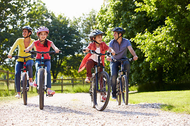 istock Hispanic Family On Cycle Ride In Countryside 466703293