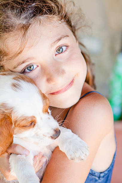 istock Little Girl with Her Dog 466703818