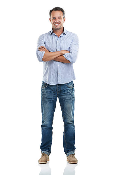 Optimistic about life Full length portrait of a handsome man standing with his arms folded against a white backgroundhttp://195.154.178.81/DATA/istock_collage/a3/shoots/785221.jpg jeans photos stock pictures, royalty-free photos & images