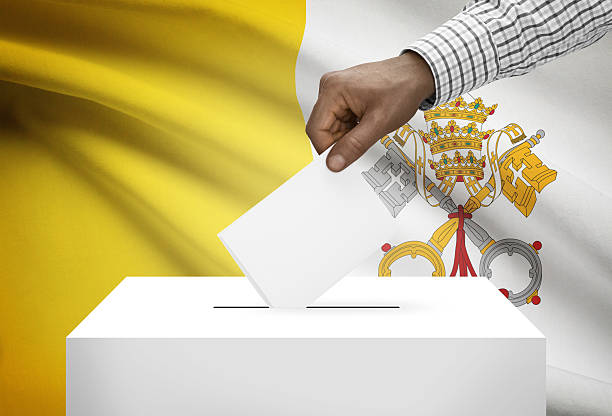 istock Ballot box with flag on background - Vatican City State 466709082