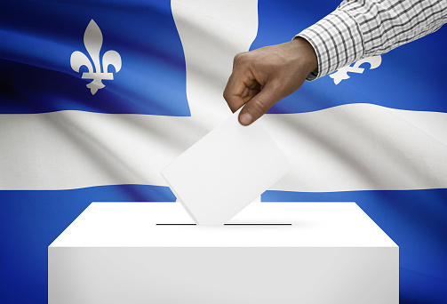 Voting concept - Ballot box with Canadian province flag on background - Quebec