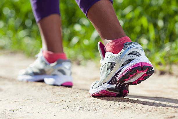 Walking/running legs sport shoes.