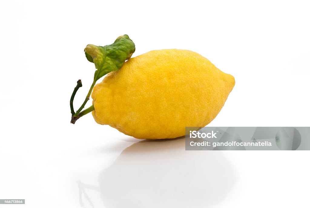 yellow sicilian fresh lemon yellow sicilian fresh lemon isolated on a white background Lemon - Fruit Stock Photo