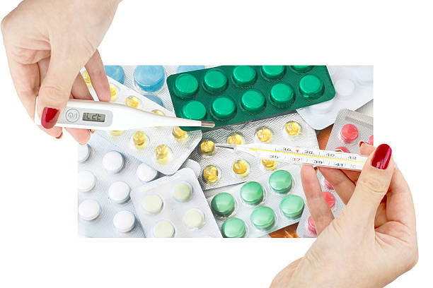 istock Different thermometer in the hands of doctors against the backdr 466714260