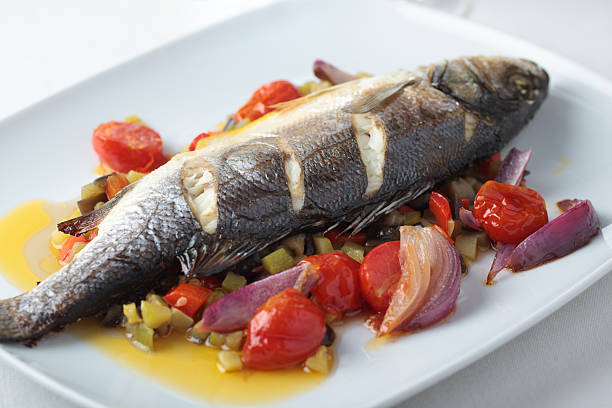 istock Baked sea bass with vegetables 466716894