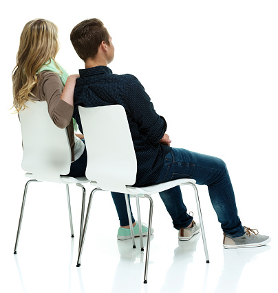Couple sitting on chair and looking awayhttp://www.twodozendesign.info/i/1.png