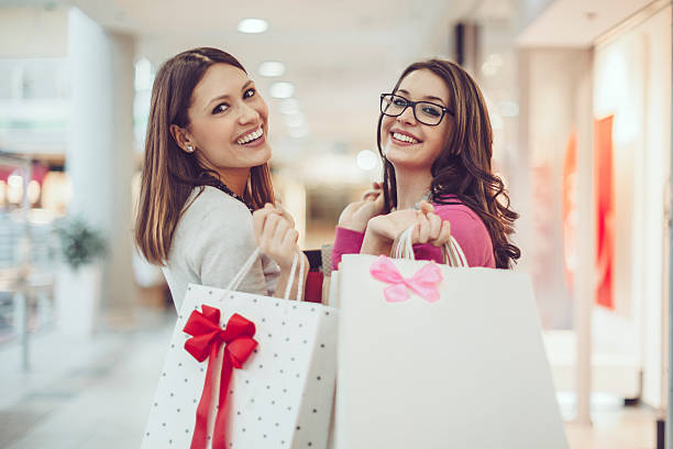istock Young women shopping together 466719168