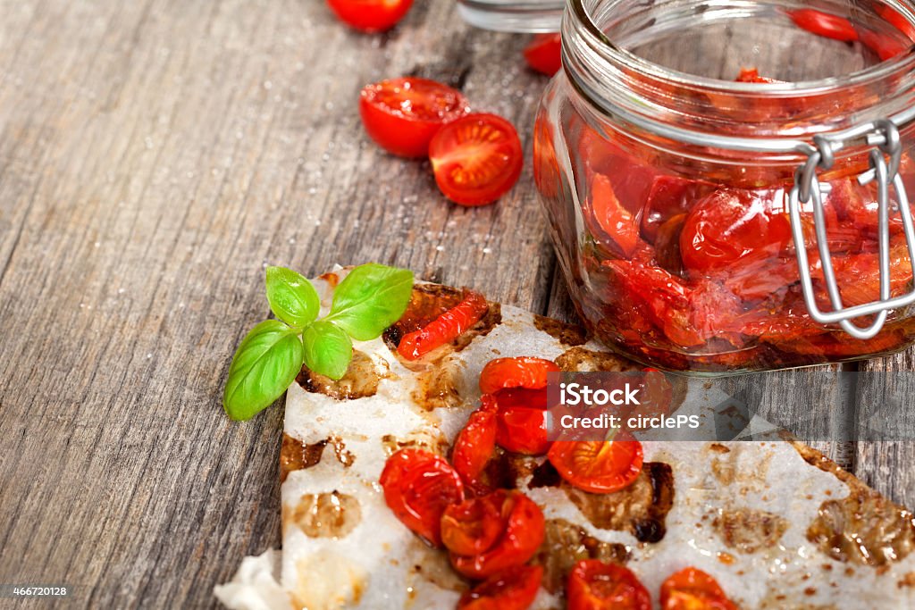 Sun dried tomatoes with olive oil in a jar sun dried tomatoes 2015 Stock Photo