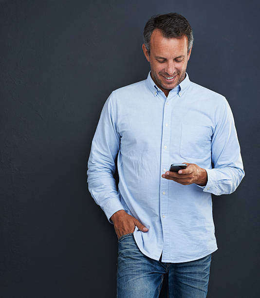 istock Staying in touch with his nifty smartphone 466720156
