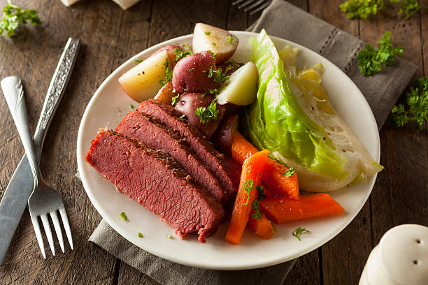 Homemade Corned Beef and Cabbage Homemade Corned Beef and Cabbage with Carrots and Potatoes beef stock pictures, royalty-free photos & images