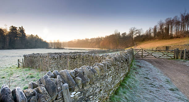 istock Clear Frosty Winters Dawn over a Cotswold landscape 466725052