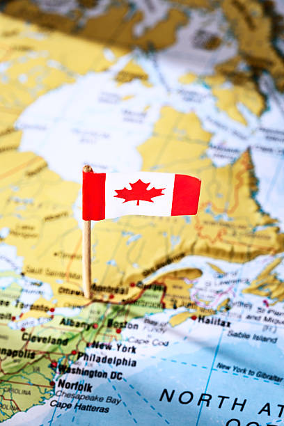 istock Canadian maple-leaf national flag on map of Canada 466727445