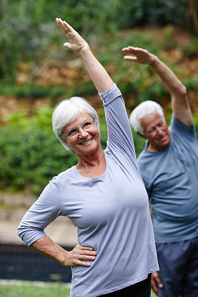 istock Stretching towards health and happiness 466728448