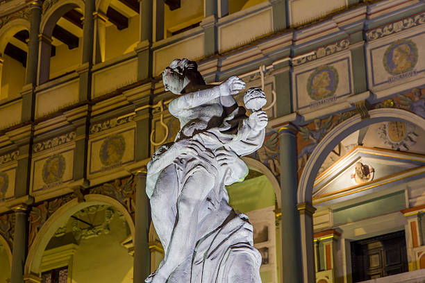 Night photo of historical fountain statue with beautifully deco stock photo