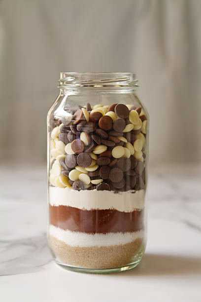 Chocolate brownie ingredients in a glass jar ready to make