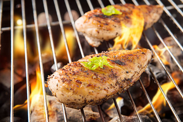 istock Marinated grilled chicken on the flaming grill 466734030