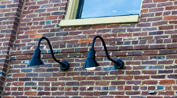 istock Street Lamps on Brick Building 466734280