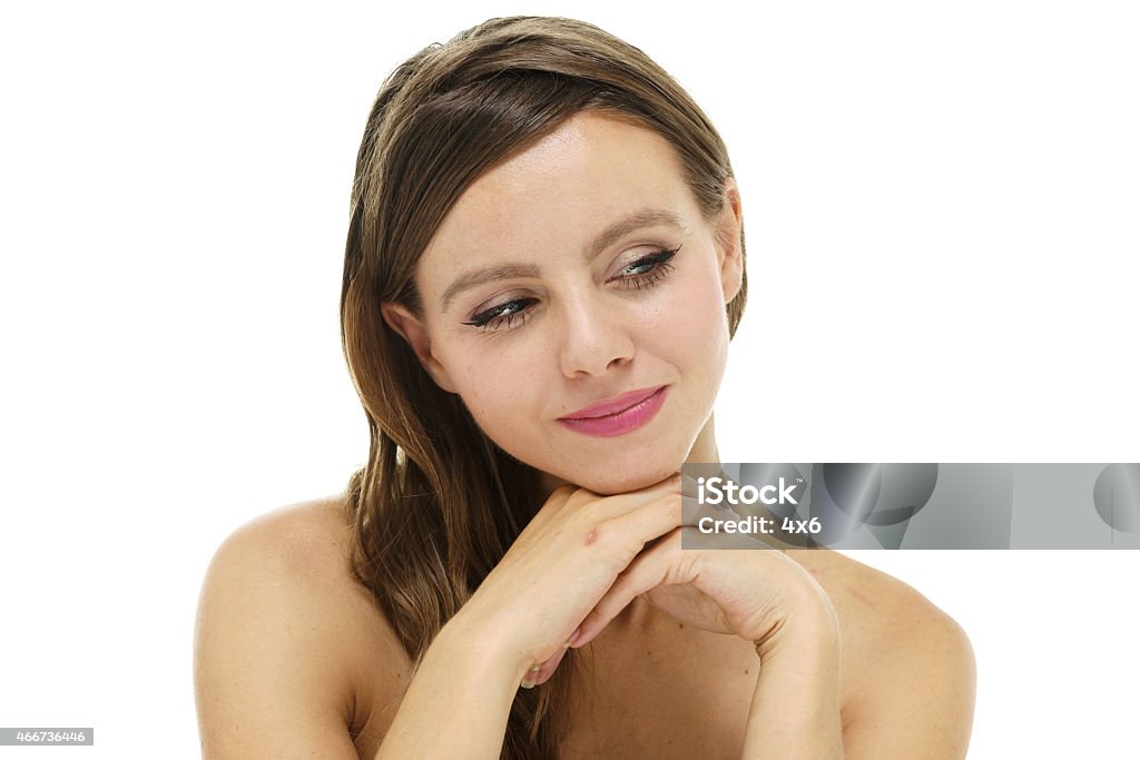 Headshot of beautiful woman looking away Headshot of beautiful woman looking awayhttp://www.twodozendesign.info/i/1.png 2015 Stock Photo